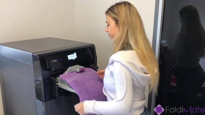 FOLDIMATE : La machine qui repasse et plie vos vêtements